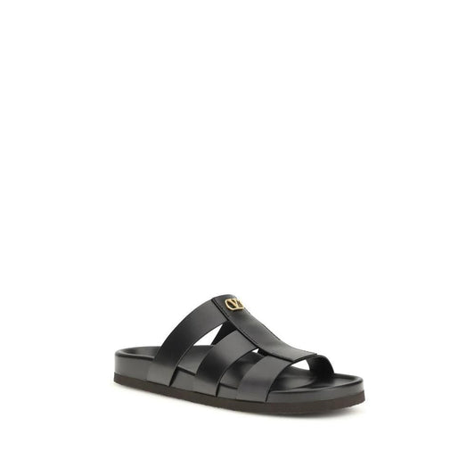 Valentino Garavani Schwarze Bos Taurus Kalbsleder-Sandalen by Valentino Garavani