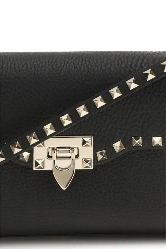 Valentino Garavani Schwarze Bos Taurus Schultertasche aus Kalbsleder by Valentino Garavani