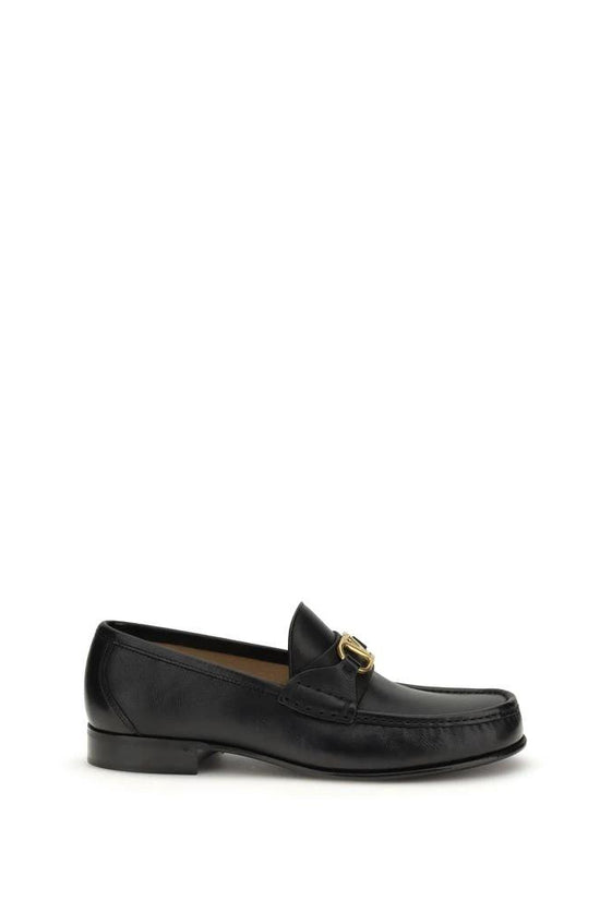 Valentino Garavani Schwarze Bos Taurus Kalbsleder Loafer zum Schlüpfen by Valentino Garavani