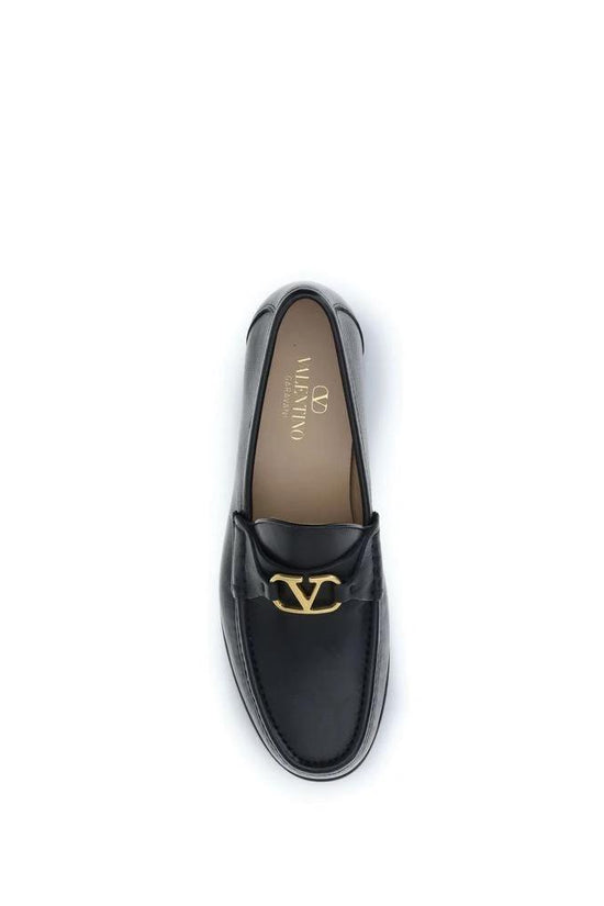 Valentino Garavani Schwarze Bos Taurus Kalbsleder Loafer zum Schlüpfen by Valentino Garavani