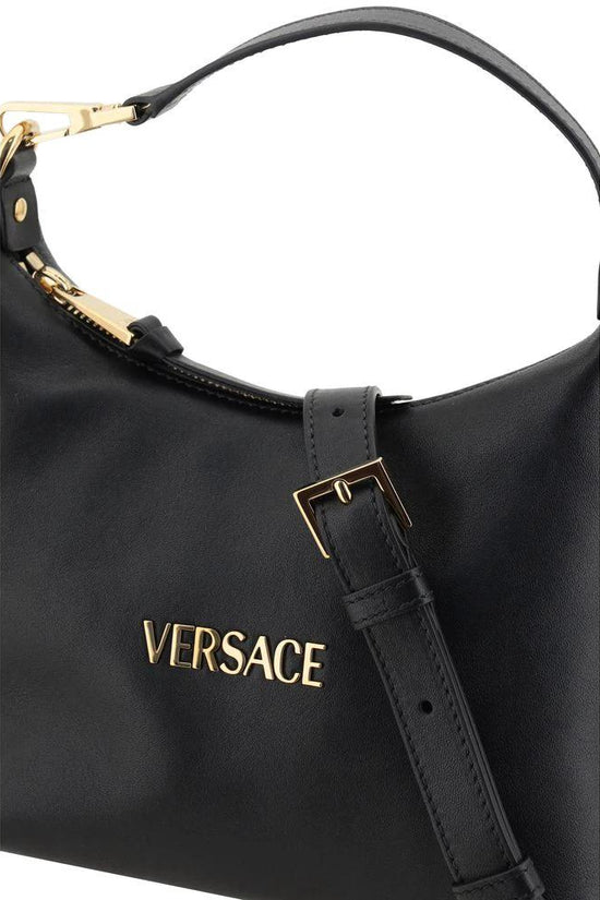 Versace Schwarze Kalbsleder Bos Taurus Handtasche by Versace