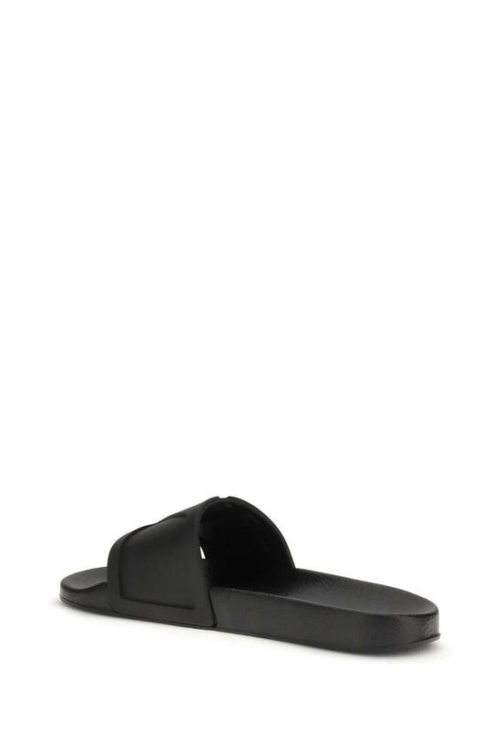 Valentino Garavani Schwarze Gummisandalen by Valentino Garavani