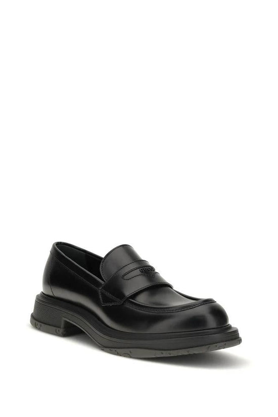 Gucci Schwarze Bos Taurus Kalbsleder Loafer zum Hineinschlüpfen by Gucci