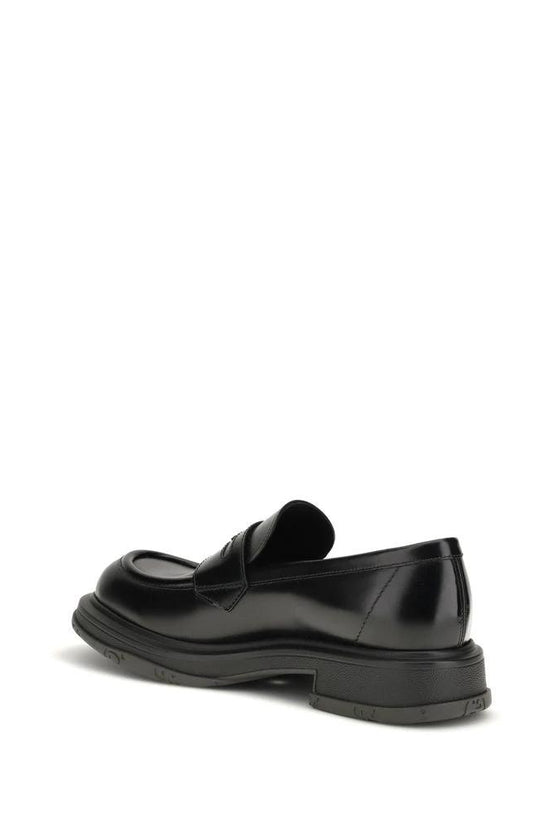 Gucci Schwarze Bos Taurus Kalbsleder Loafer zum Hineinschlüpfen by Gucci
