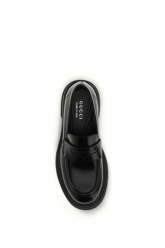 Gucci Schwarze Bos Taurus Kalbsleder Loafer zum Hineinschlüpfen by Gucci