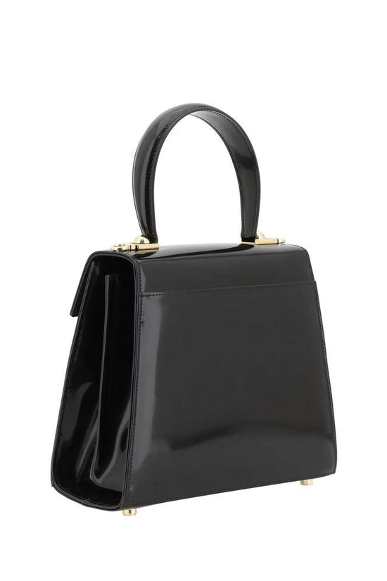 Ferragamo Schwarze Kalbsleder Bos Taurus Handtasche by Ferragamo