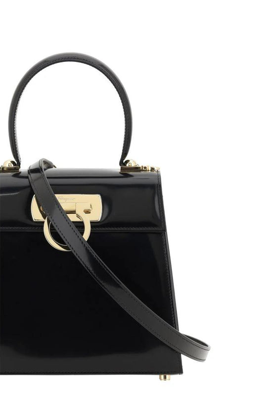 Ferragamo Schwarze Kalbsleder Bos Taurus Handtasche by Ferragamo