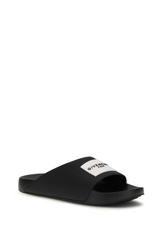 Givenchy Schwarze Gummipantoletten by Givenchy