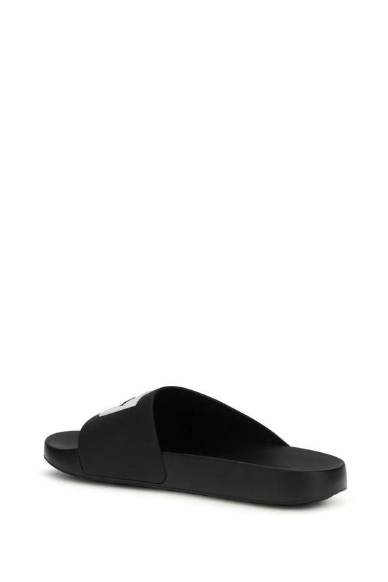 Givenchy Schwarze Gummipantoletten by Givenchy