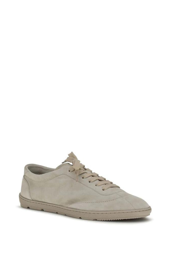 Brunello Cucinelli Beige Calf Leather Bos Taurus Low Top Sneakers by Brunello Cucinelli