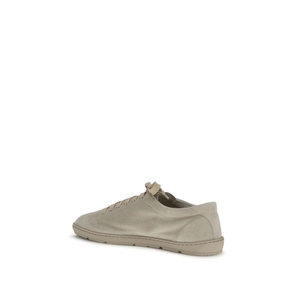 Brunello Cucinelli Beige Calf Leather Bos Taurus Low Top Sneakers by Brunello Cucinelli