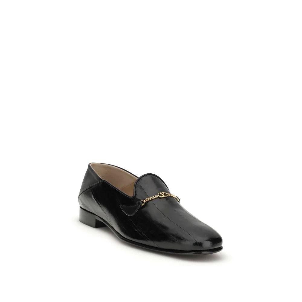 Valentino Garavani Schwarze Hagfisch-Slipper by Valentino Garavani