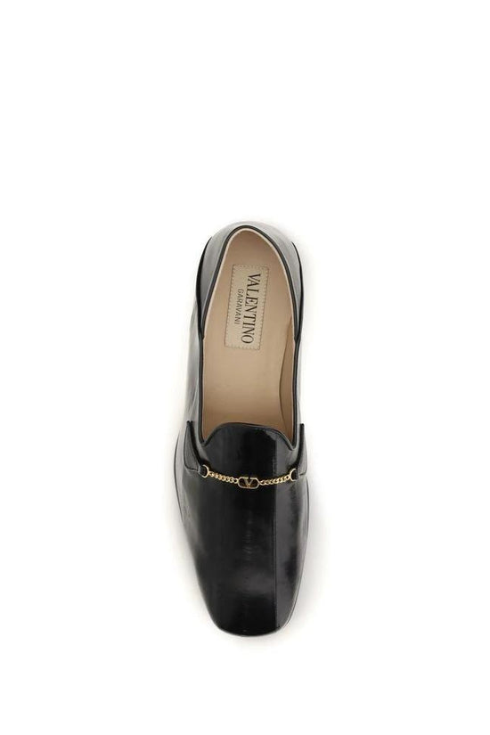 Valentino Garavani Schwarze Hagfisch-Slipper by Valentino Garavani