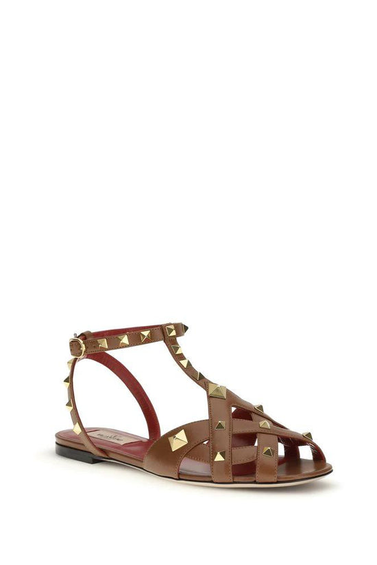 Valentino Garavani Braune Sandalen aus Ziegenleder mit Riemenverschluss by Valentino Garavani