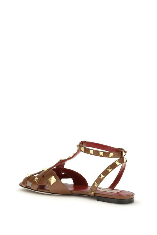 Valentino Garavani Braune Sandalen aus Ziegenleder mit Riemenverschluss by Valentino Garavani