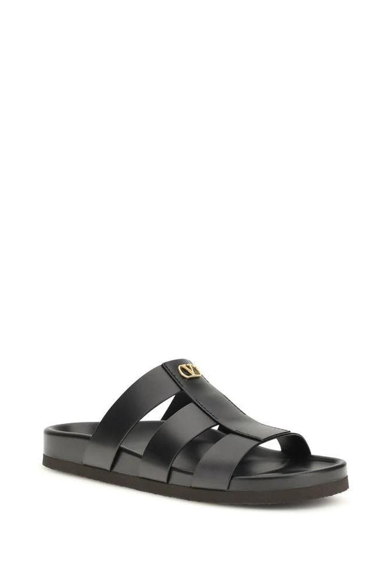 Valentino Garavani Schwarze Bos Taurus Kalbsleder-Sandalen by Valentino Garavani