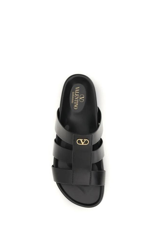 Valentino Garavani Schwarze Bos Taurus Kalbsleder-Sandalen by Valentino Garavani