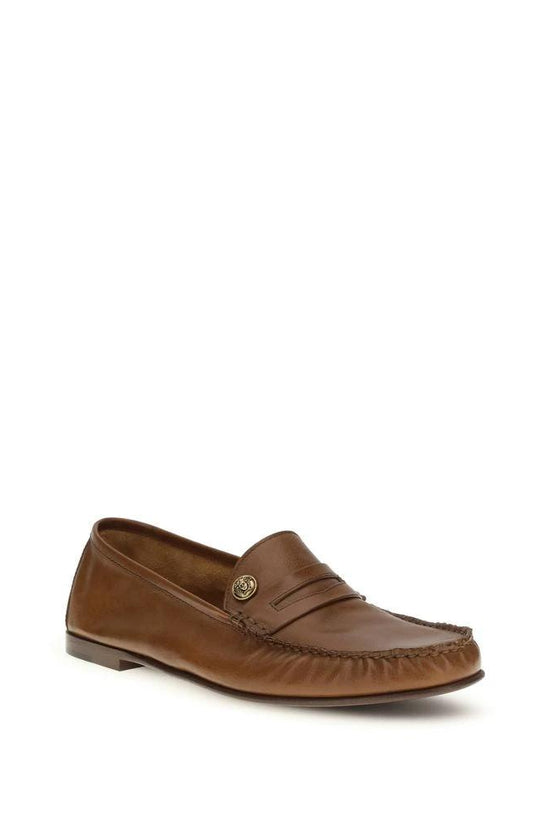 Versace Braune Kalbsleder Bos Taurus Slipper-Loafer by Versace