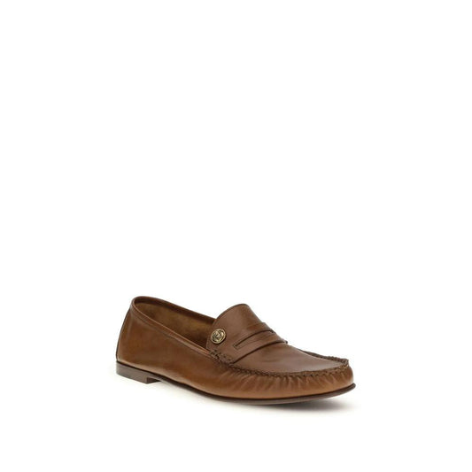 Versace Braune Kalbsleder Bos Taurus Slipper-Loafer by Versace