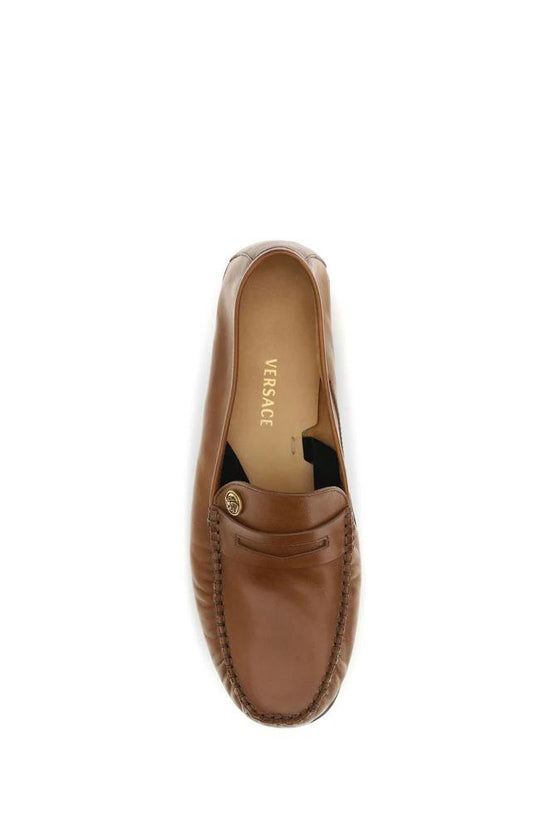 Versace Braune Kalbsleder Bos Taurus Slipper-Loafer by Versace