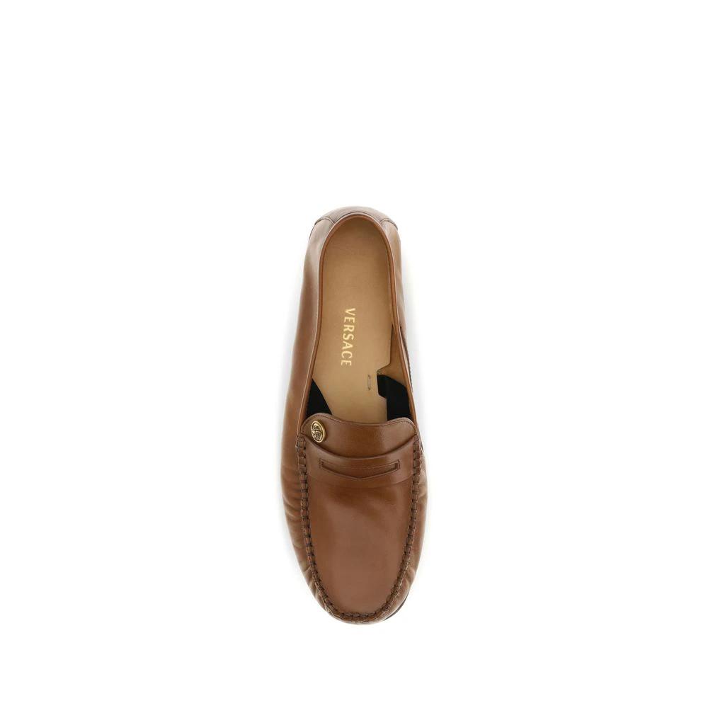 Versace Braune Kalbsleder Bos Taurus Slipper-Loafer by Versace