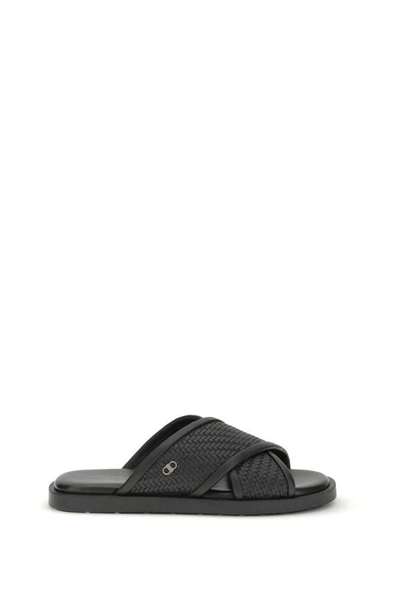 Ferragamo Schwarze Bos Taurus Kalbsleder flache Sandalen by Ferragamo