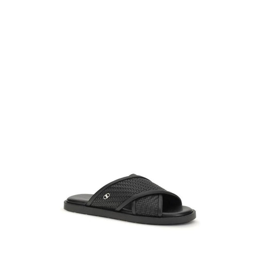 Ferragamo Schwarze Bos Taurus Kalbsleder flache Sandalen by Ferragamo