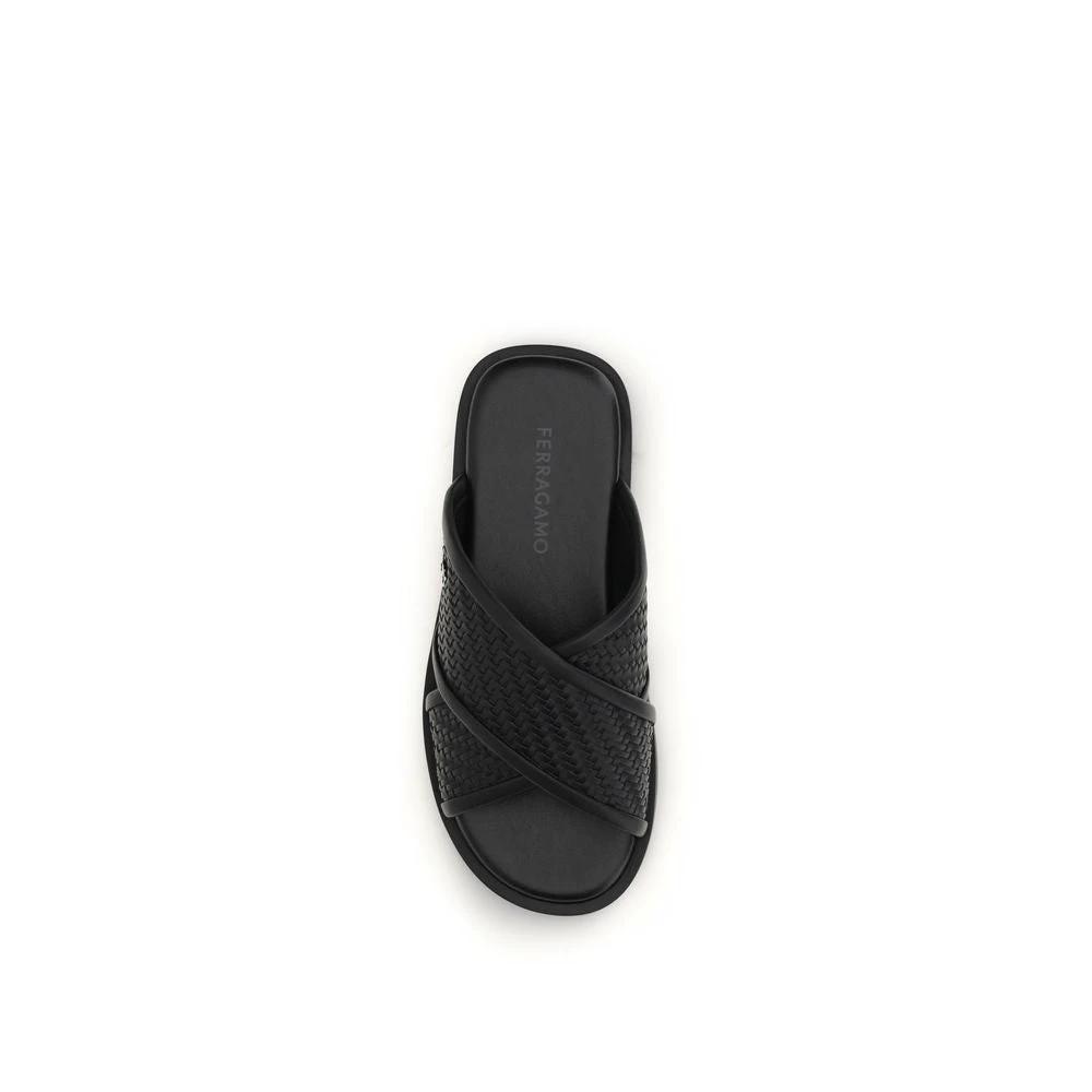 Ferragamo Schwarze Bos Taurus Kalbsleder flache Sandalen by Ferragamo