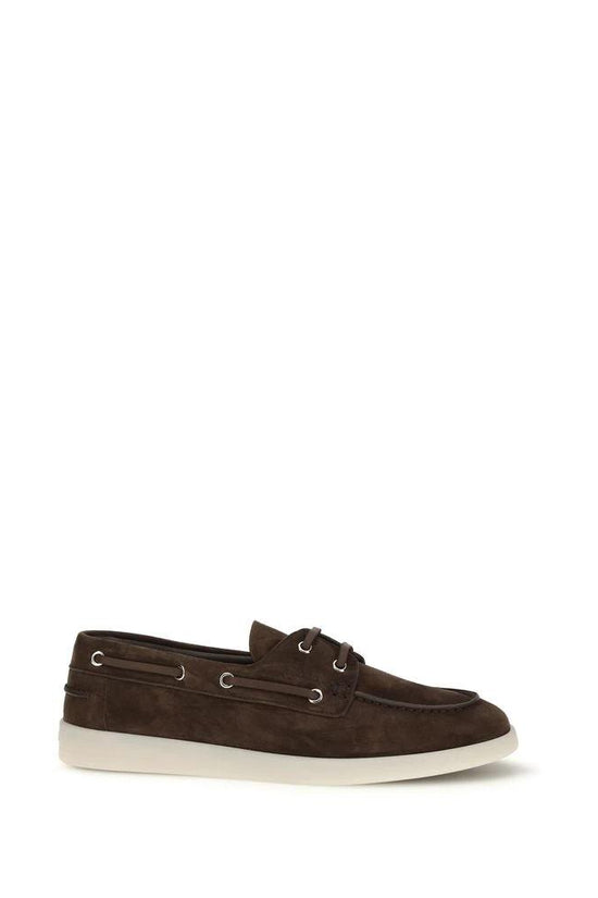 Prada Braune Kalbsleder Bos Taurus Slipper-Loafer by Prada