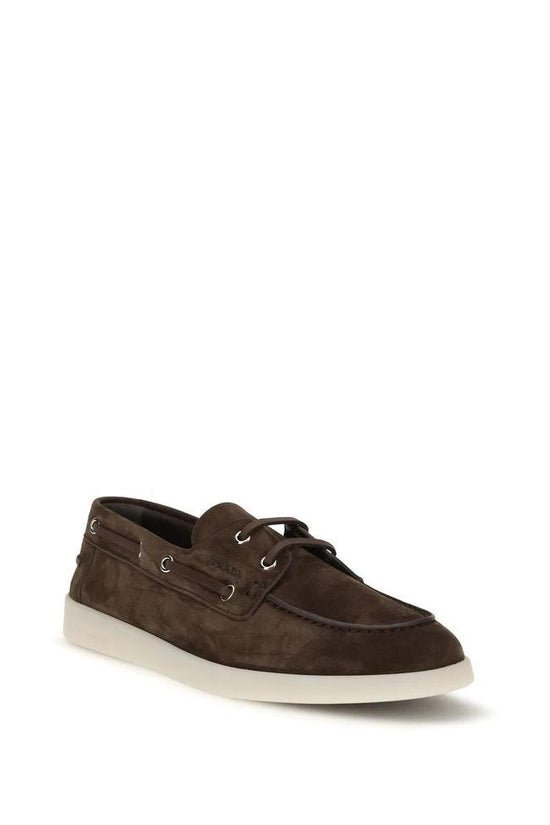 Prada Braune Kalbsleder Bos Taurus Slipper-Loafer by Prada
