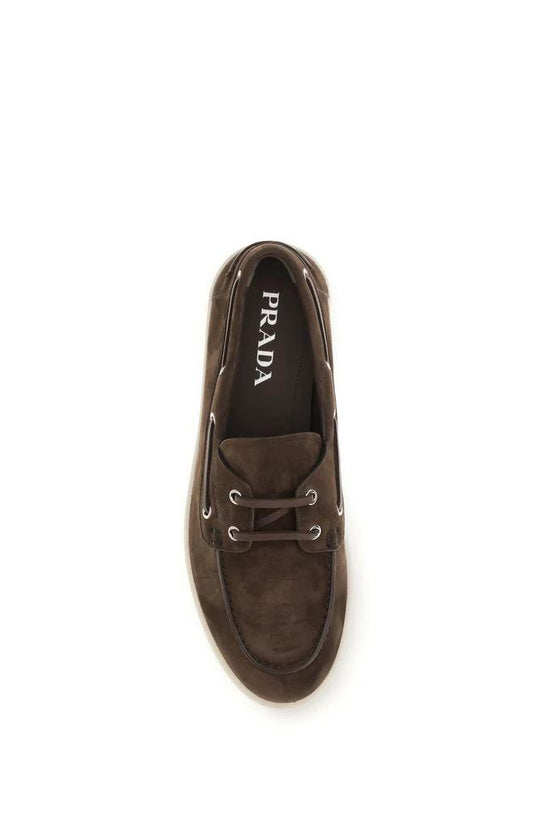 Prada Braune Kalbsleder Bos Taurus Slipper-Loafer by Prada
