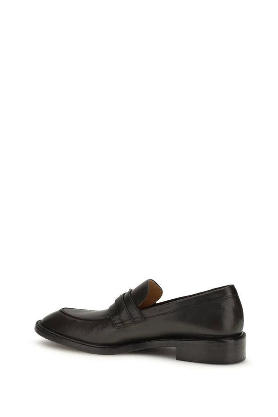 Versace Schwarze Bos Taurus Kalbsleder Loafer zum Hineinschlüpfen by Versace