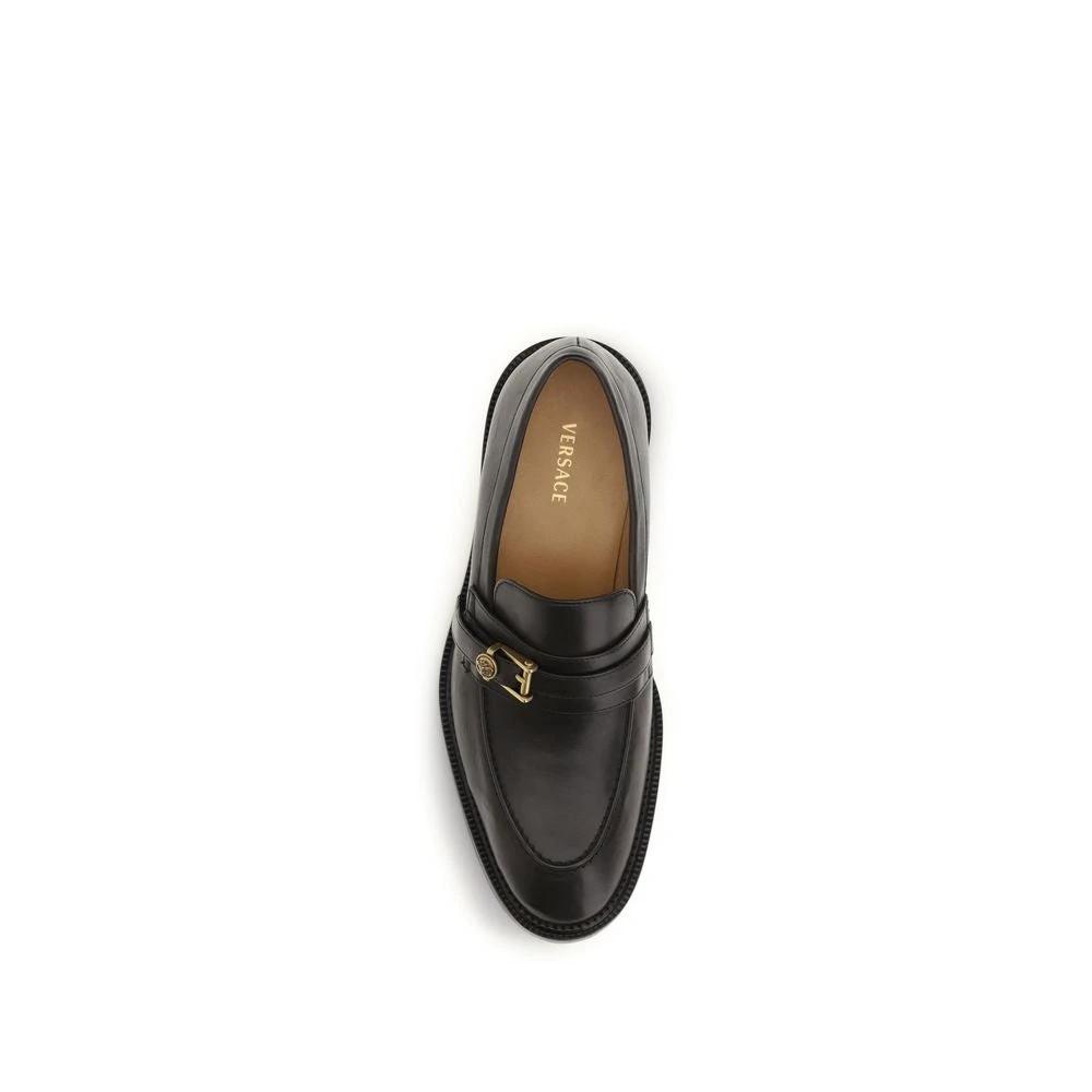 Versace Schwarze Bos Taurus Kalbsleder Loafer zum Hineinschlüpfen by Versace