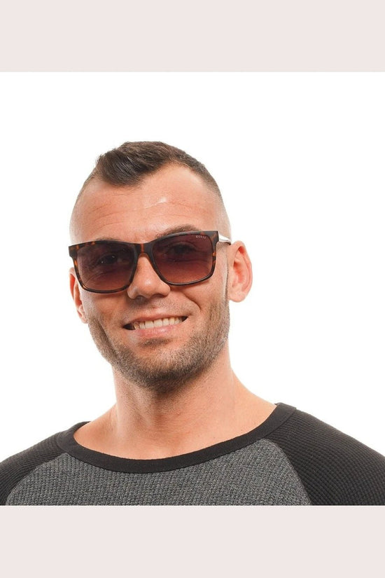 Guess Sonnenbrille Braun | ELORÉ by Guess