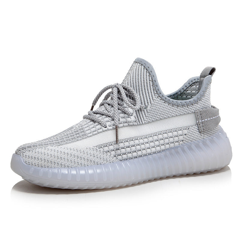 Sneaker Atmungsaktive Netzstruktur Alltagsbegleiter Und Trainingskomfort Bequemlichkeit in grauem Mesh mit runder Zehenkappe.