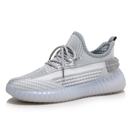 Sneaker Atmungsaktive Netzstruktur Alltagsbegleiter Und Trainingskomfort Bequemlichkeit in grauem Mesh mit runder Zehenkappe.