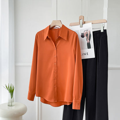Bluse aus Satinoberstoff in Orange Französischer Stil GeraderSchnittMitFeinemFall, schlichter Revers-Kragen, lange Ärmel.