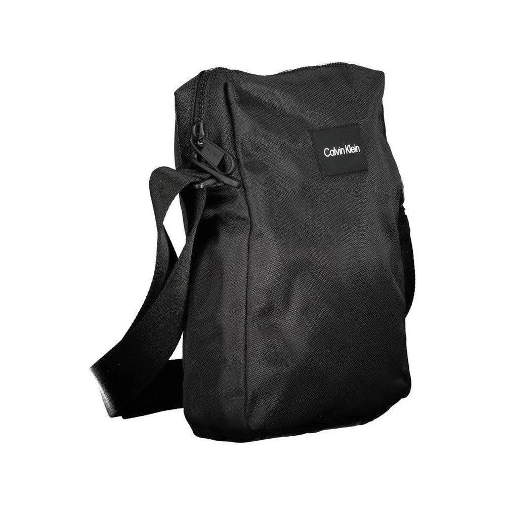 Calvin Klein Schultertasche Schwarz | ELORÉ by Calvin Klein