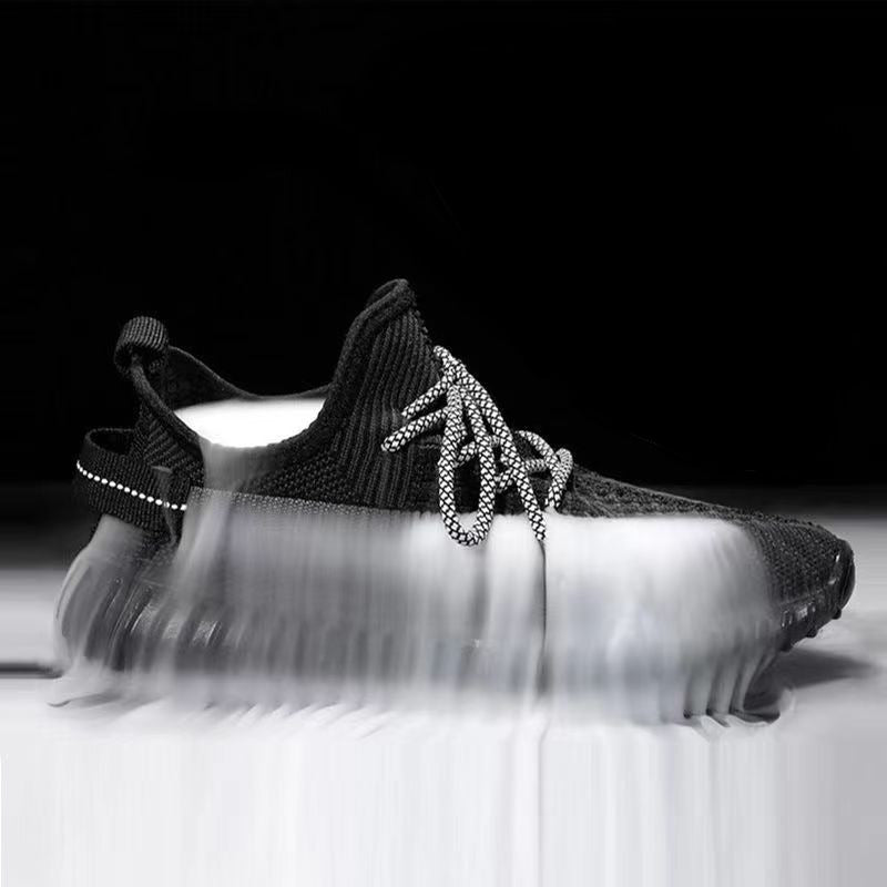 Sneaker Atmungsaktive Netzstruktur Alltagsbegleiter Und Trainingskomfort Bequemlichkeit in Schwarz mit runder Zehenkappe.