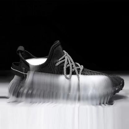 Sneaker Atmungsaktive Netzstruktur Alltagsbegleiter Und Trainingskomfort Bequemlichkeit in Schwarz mit runder Zehenkappe.