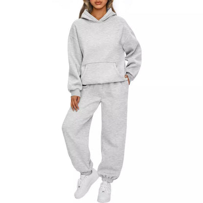 Damen Hoodie Und Hose Set Alltagslookkomfort GebürstetesFleecegewebe HaptikFaszination in hellem Grau, bequeme Passform, moderner Schnitt.