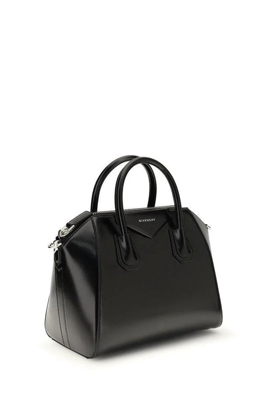Givenchy Schwarze Kalbsleder-Bos-Taurus-Handtasche by Givenchy