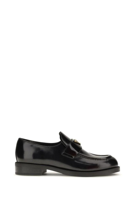 Prada Schwarze Bos Taurus Kalbsleder Loafer zum Hineinschlüpfen by Prada