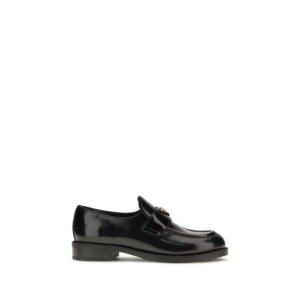 Prada Schwarze Bos Taurus Kalbsleder Loafer zum Hineinschlüpfen by Prada