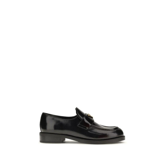 Prada Schwarze Bos Taurus Kalbsleder Loafer zum Hineinschlüpfen by Prada
