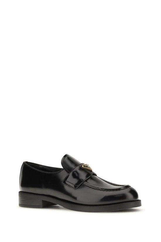 Prada Schwarze Bos Taurus Kalbsleder Loafer zum Hineinschlüpfen by Prada