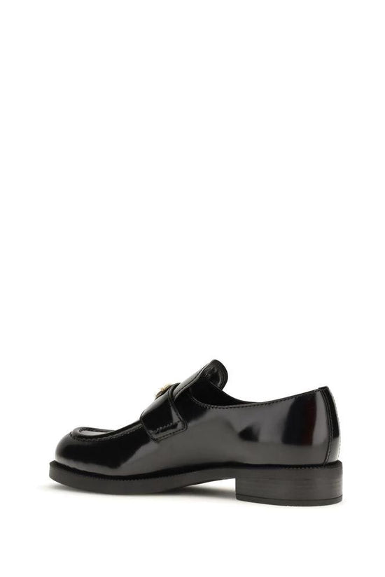 Prada Schwarze Bos Taurus Kalbsleder Loafer zum Hineinschlüpfen by Prada