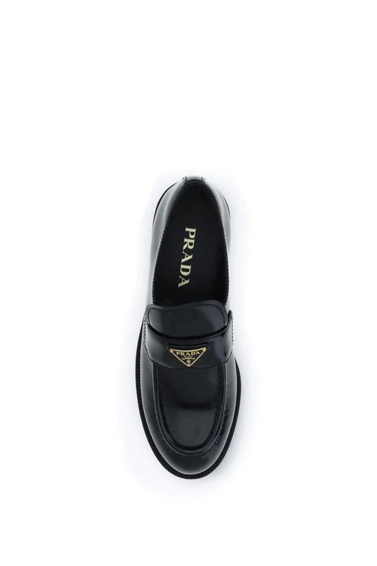 Prada Schwarze Bos Taurus Kalbsleder Loafer zum Hineinschlüpfen by Prada