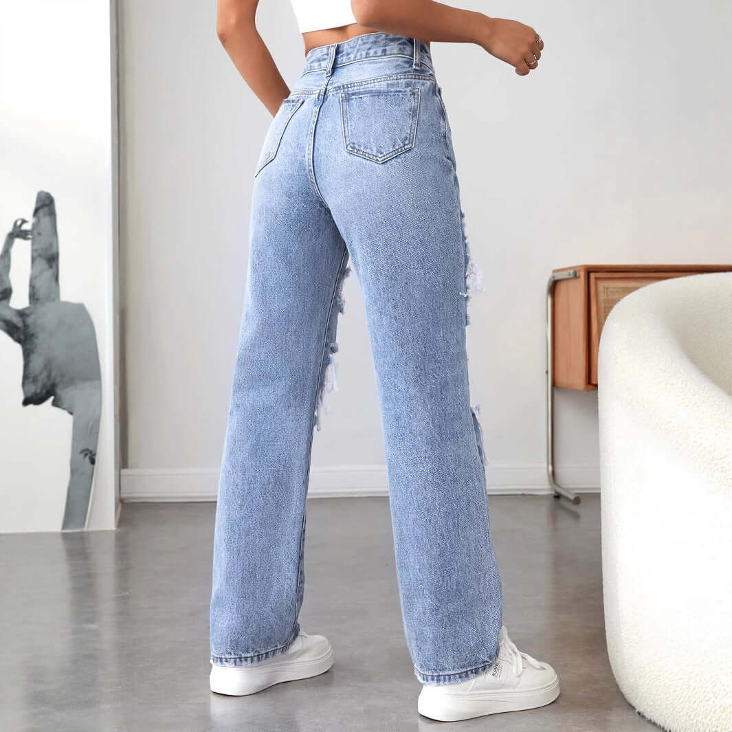 Damen Ausgefranste Denim Hose Relaxed Fit Street Style in hellblau, modern und hochwertig für trendige Streetwear.